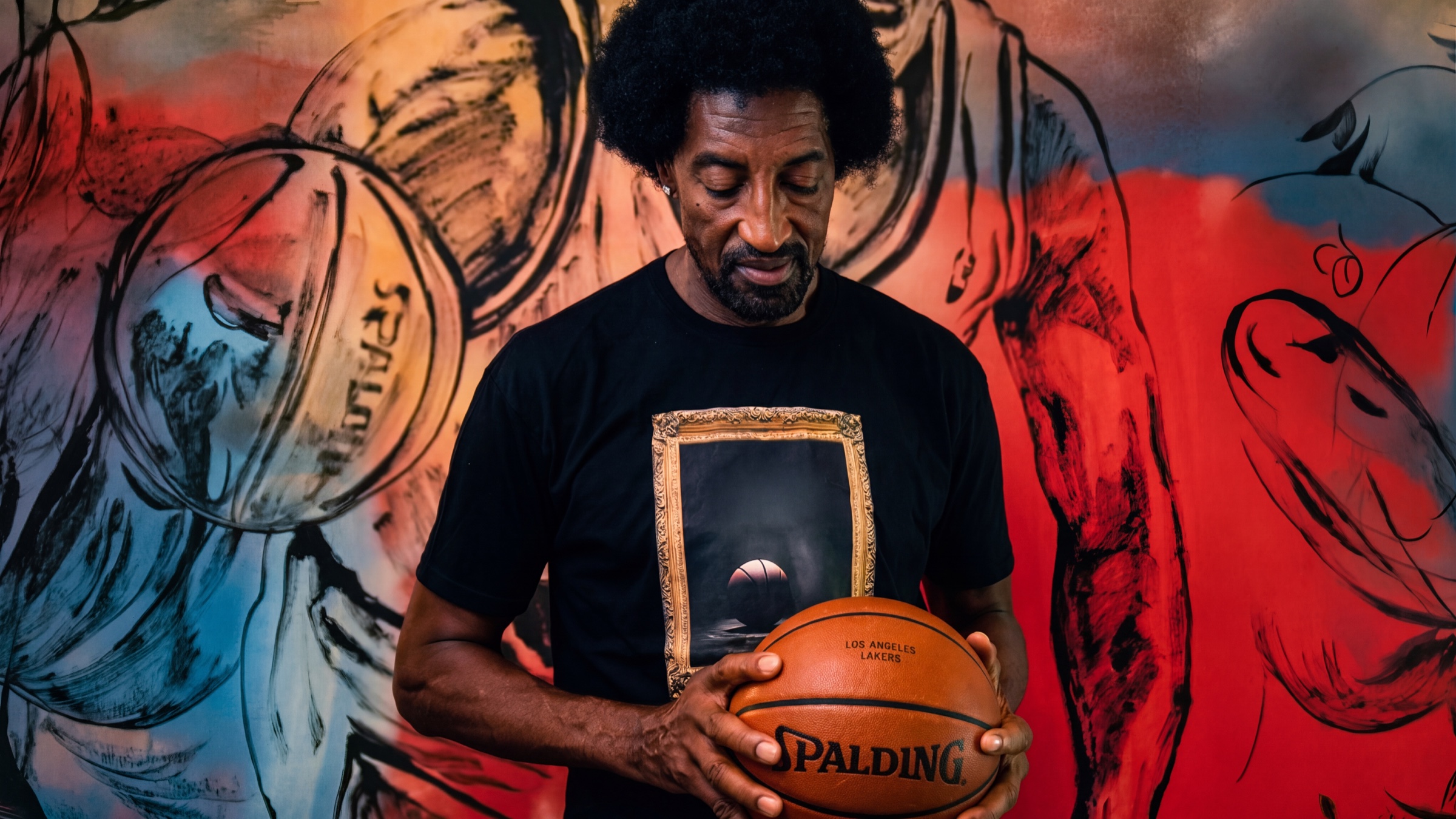 Scottie Pippen holding the original Game 5 BALL